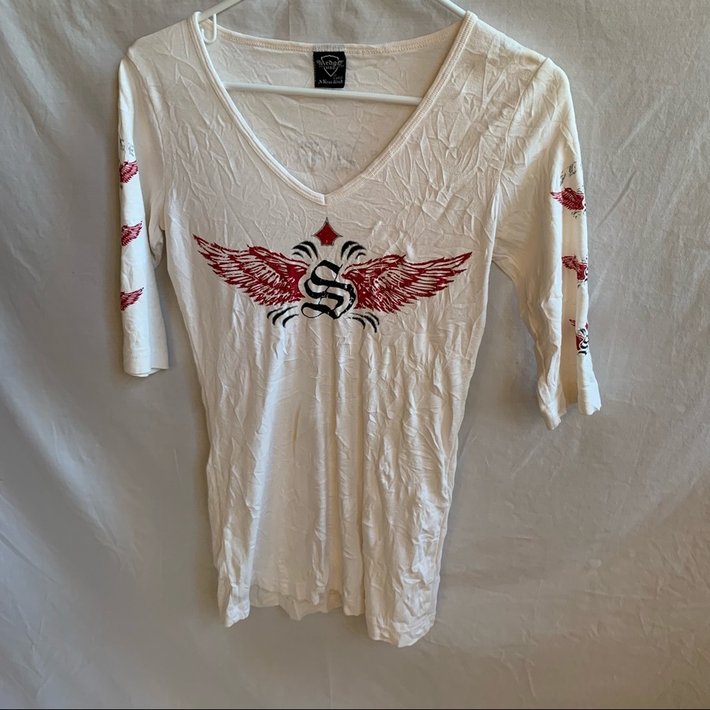 Sledge cream colored top